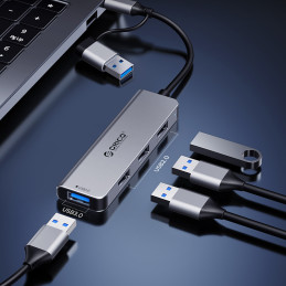 „Orico YSB4-U2“ USB-A/ USB-C šakotuvo prijungimo stotelė, 2x USB-A 2.0 + 1x USB-A 3.0 + 1x USB-C 2.0 + 1x USB-C – pilka