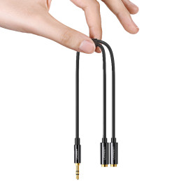 Ugreen kabelio ausinių skirstytuvo mini lizdas 3,5 mm - 2 x mini lizdas 3,5 mm (2 x stereo išvestis) 20 cm baltas (AV134...