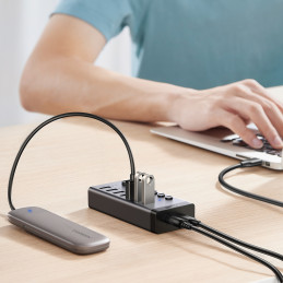 Ugreen daugiafunkcis šakotuvas 7in1 USB C tipo - 7x USB A tipo 3.0 PD DC 12V pilkas (CM481)